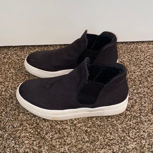 Black slip-on sneakers